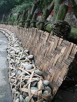 Fig. 3 Reconstruction of wicker baskets and stones traditionally used to divert river flow at Dujiangyan, Sichuan province