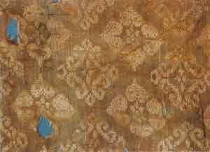 Fig. 3 Tang dynasty fine silk (ling) with persimmon pattern against yellow ground unearthed in Dulan, Qinghai province