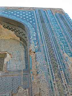 PhoPhotograph showing detail of upper right corner at front of the Tughluq Tömur Khan mazar in Huocheng.