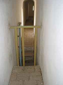 Photograph showing stairway and ambulatory within the walls of  Tughluq Tömur Khan <i>mazar</i> in Huocheng in 2004.