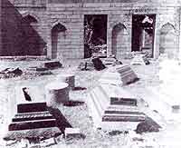 Fig. 6 A similar picture taken in 1958, showing strewn pieces of the stone pillars of the prayer hall that have since been re-erected, and a number of tombs relocated to the Quanzhou Maritime History Museum.